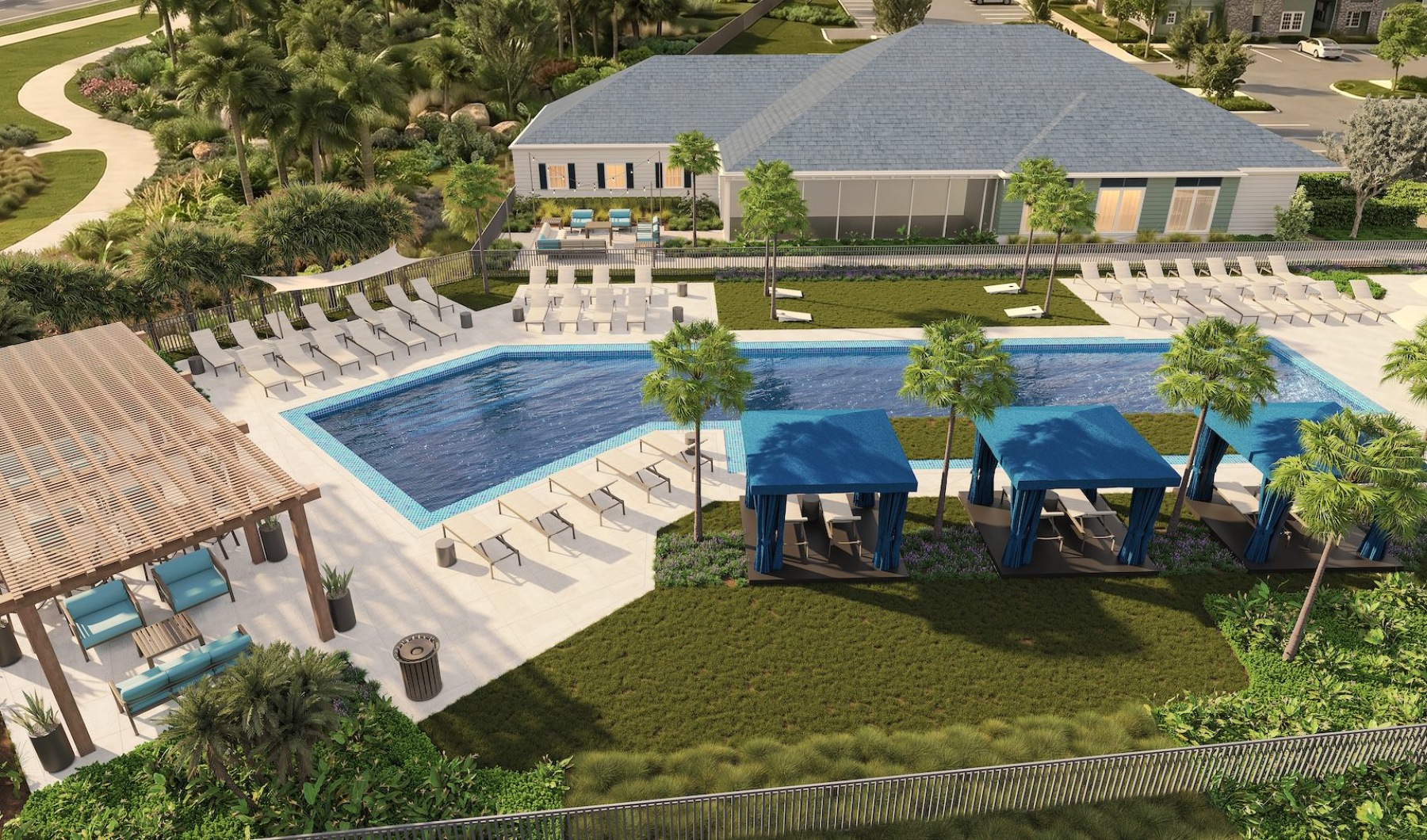 an aerial view of an apartment complex with a pool
