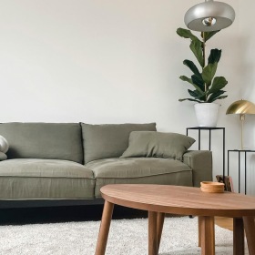 a living room with a couch and a coffee table